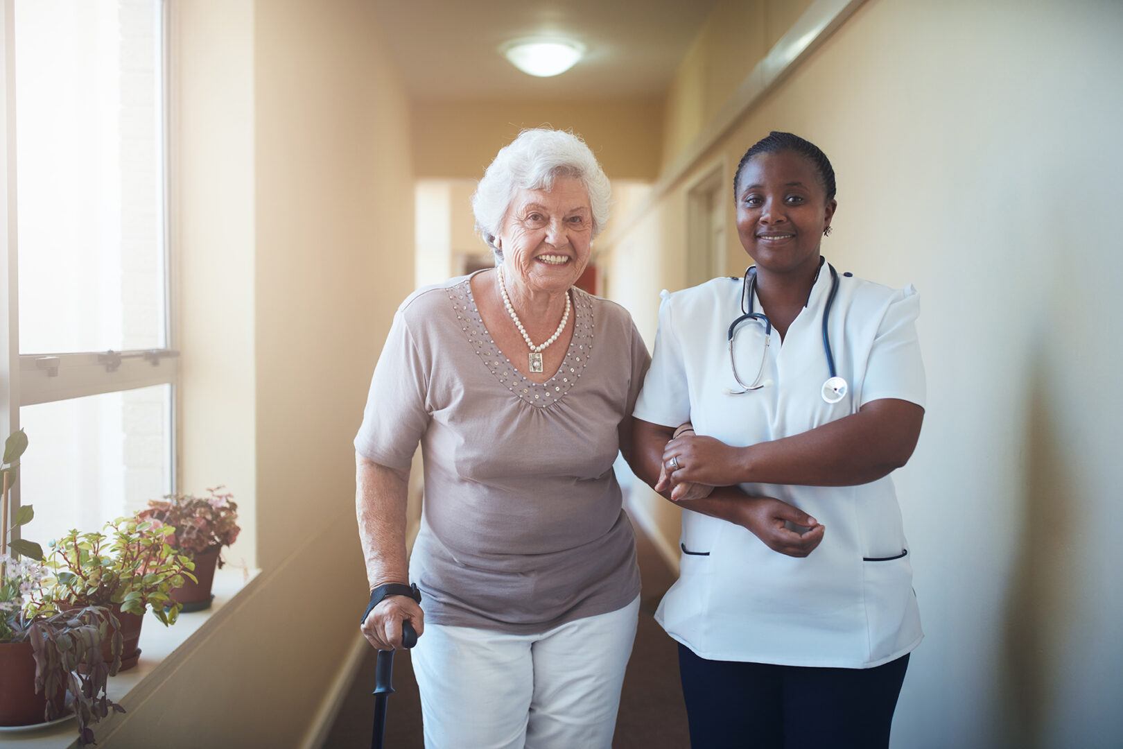 A senior woman having great time with a caregiver